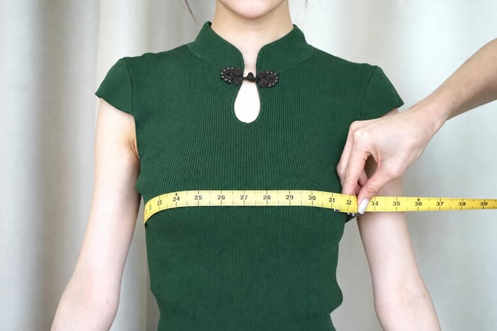 KoKodress model being measured around the fullest part of the bust