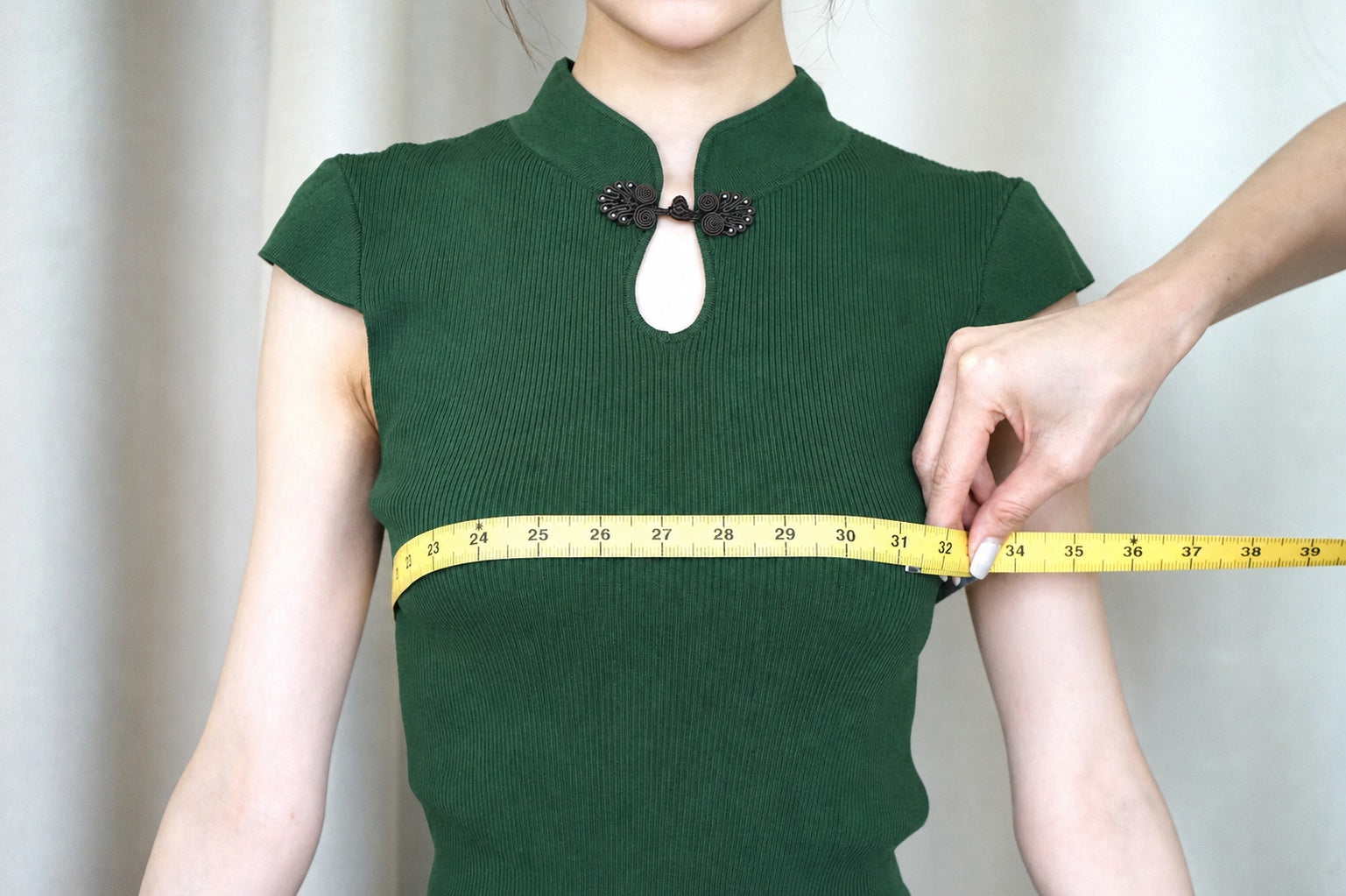 Measuring around the fullest part of the bust